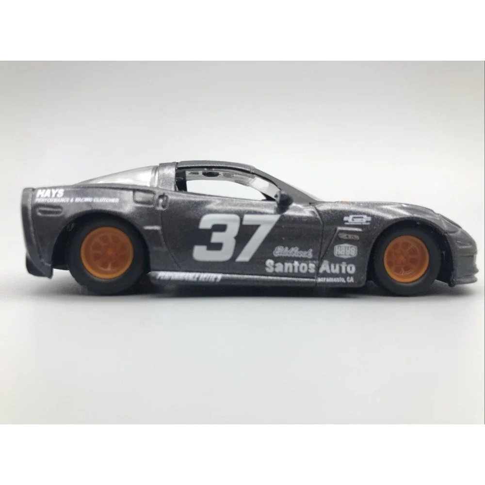 Jada 2006 06 Chevrolet Chevy Corvette Z06 Race Car Gray Diecast 1/64 Rubber Tire
